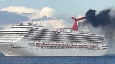 eBlue_economy_Carnival Freedom Belches Smoke in Cayman Islands